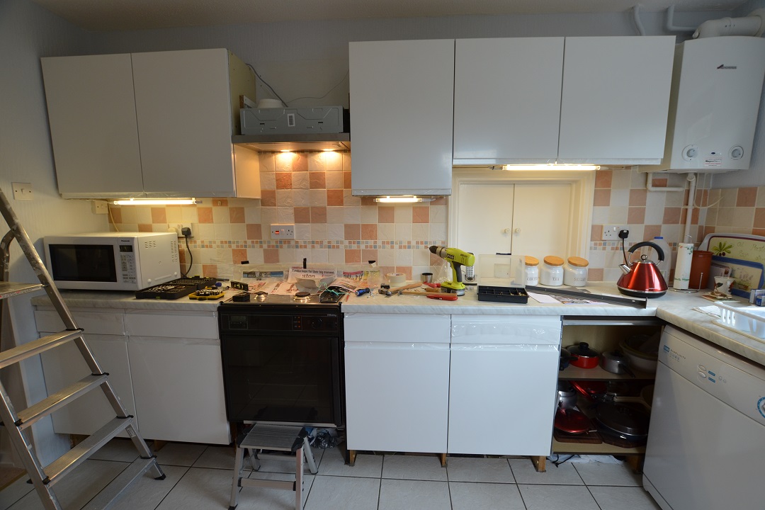 customers refurb kitchen with new lighting being installed